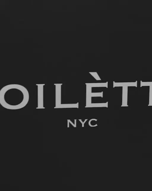 Girl walking with Toilètte Box in soho